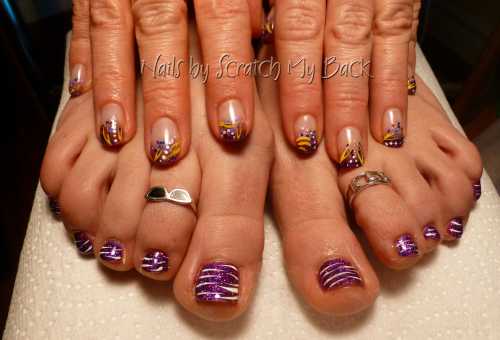 Gel nails and Rockstar toes with hand painted nail art on both.